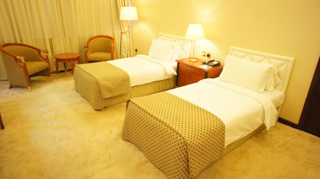 Gloria Hotel Доха Номер фото
