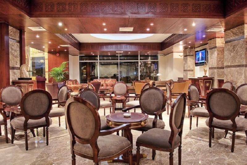 Gloria Hotel Доха Ресторан фото