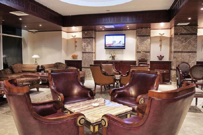 Gloria Hotel Доха Ресторан фото