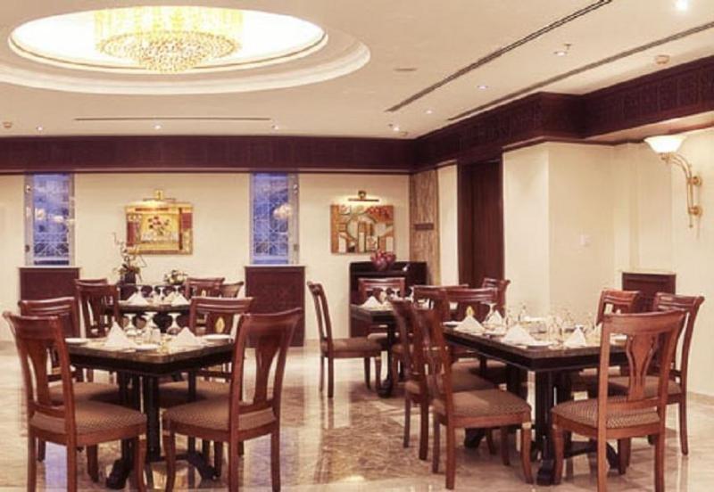 Gloria Hotel Доха Ресторан фото