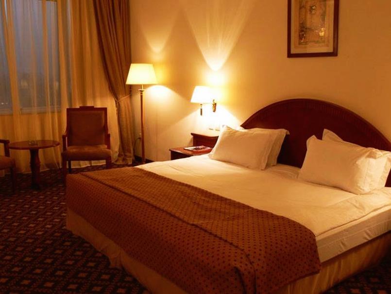 Gloria Hotel Доха Номер фото